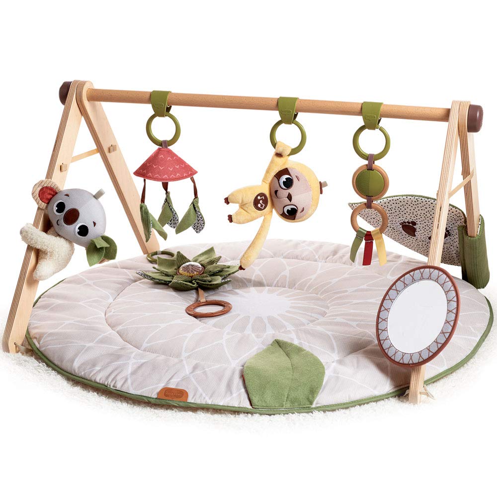 Kūdaiņu muzikālais spēļu paklājiņš Tiny Love Luxe Developmental Gymini ar koka arku, 0+ mēneši, 20 aktivitātes, boho stils