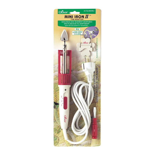Clover 8003EU Mini-gludeklis II - Compact white fabric glue pen for precise application and quick drying.