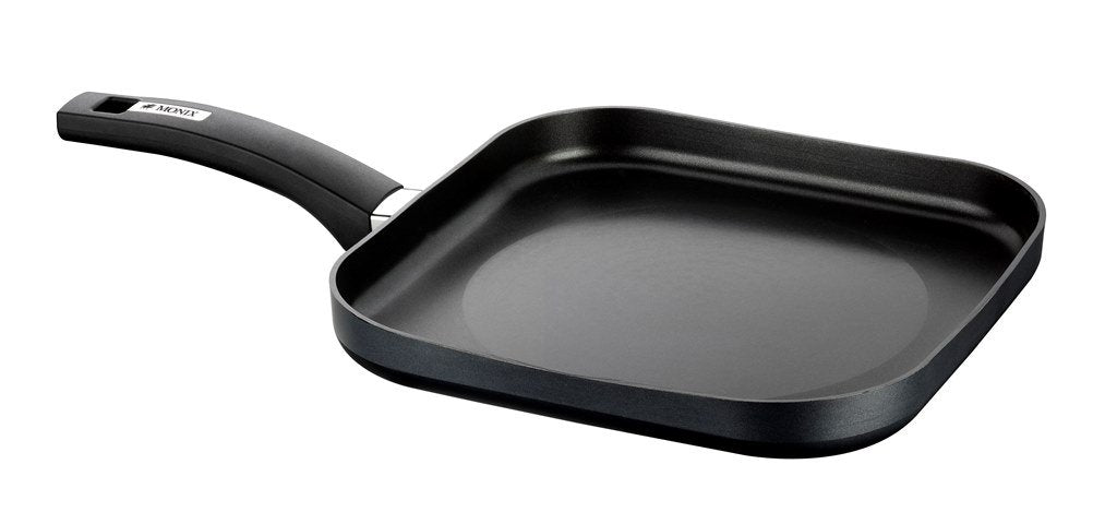 MONIX Resistent Plus - 28 cm square aluminum grill with non-stick coating, ideal for healthy cooking.