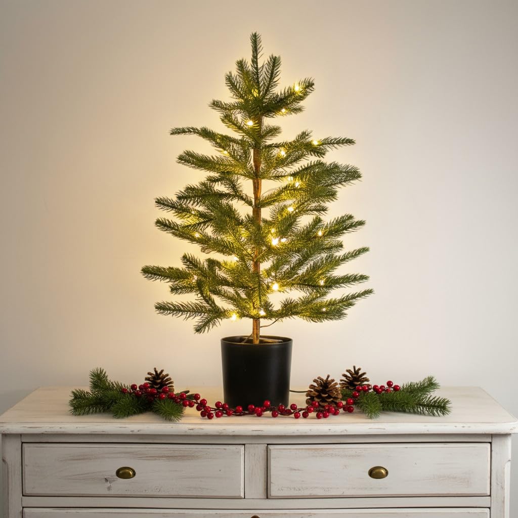 Mākslīgā Ziemassvētku eglīte 60 cm ar baterijām darbināmu LED virteni, podā, silti balta gaisma