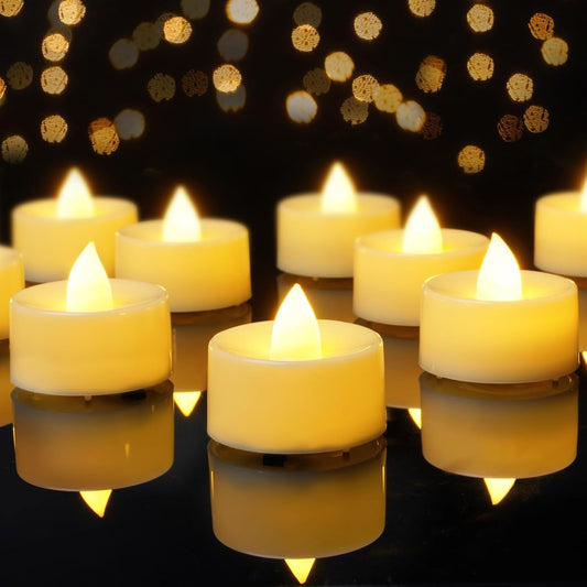 Flammenlose LED tējas sveces ar baterijām AMAGIC, 12 gab., silti balta gaisma, vaska apvalks