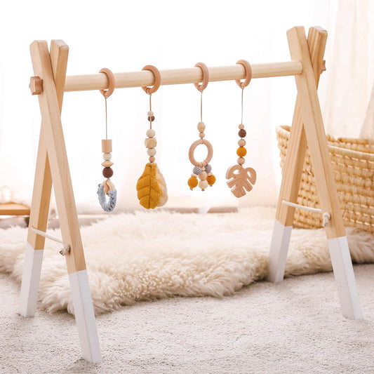 Koka bērnu aktivitāšu arka Promise Babe, baby gym, jaundzimušo rotaļu arka, dzelteni piekarināmi piekariņi, noņemams dizains, koka spēļu arka bērniem